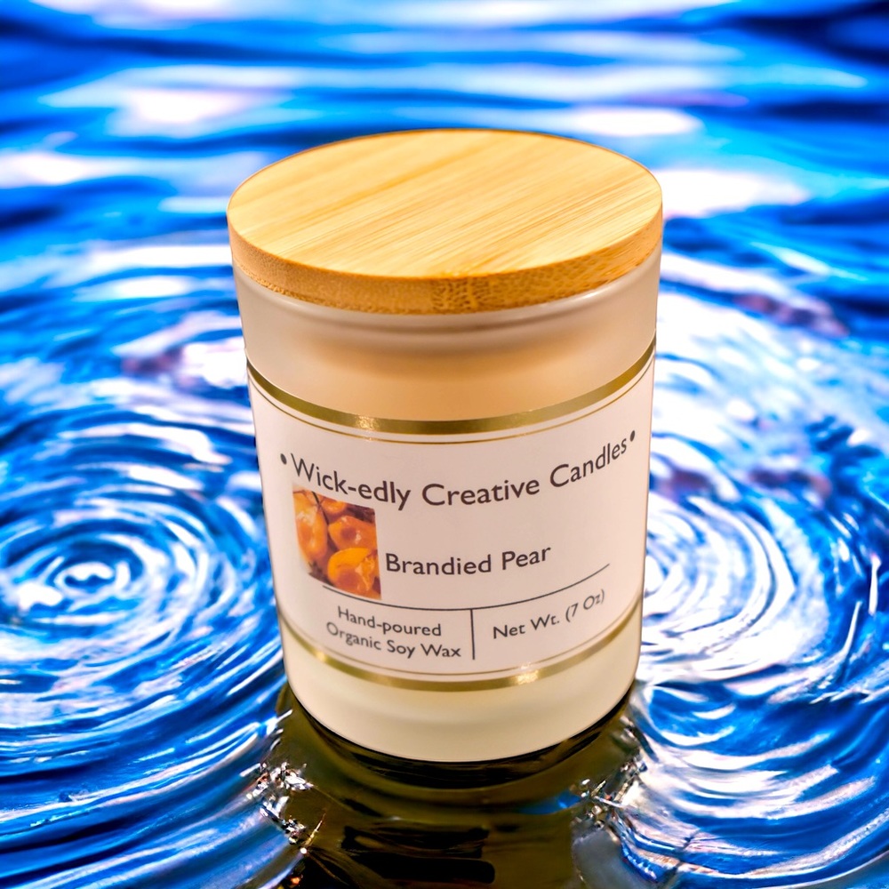 Hand-poured 7oz Organic Soy Wax Candle. Scent is Brandied Pear.